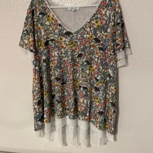 NWOT flowered top. XL